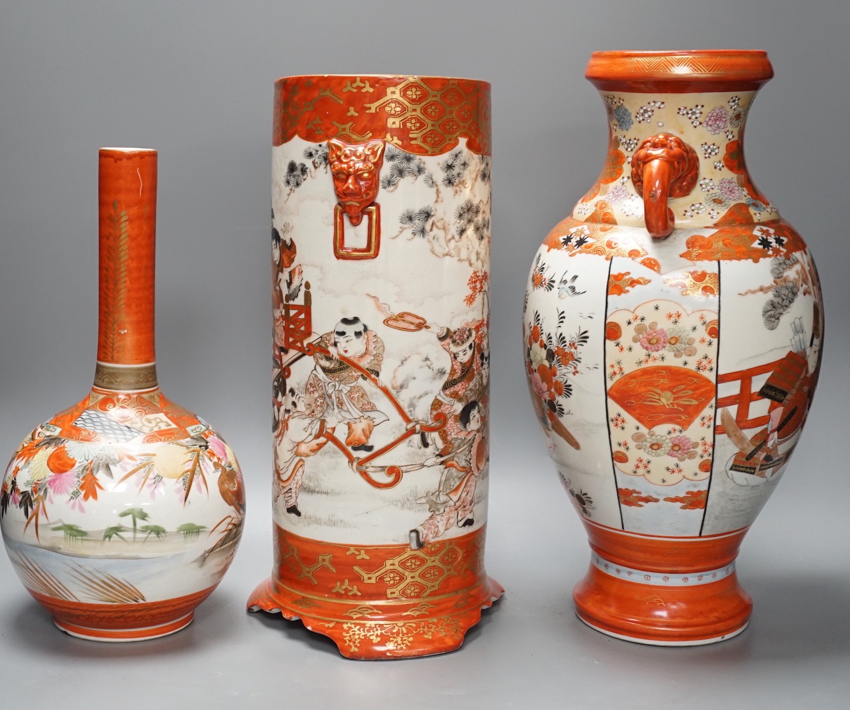 A large Japanese Kutani sleeve vase, bottle vase and another, sleeve vase 34.5 cms high